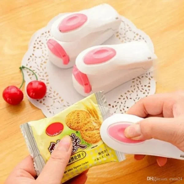 "Portable Mini Sealer: Keep Your Food Fresh with this Household Sealing Machine"